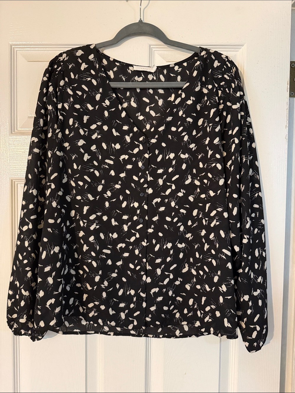 Lush Black and White Abstract Print V-Neck Blouse